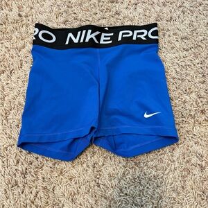 Blue Nike Pro shorts